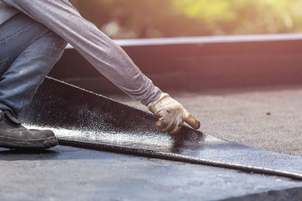 Professional Basement Waterproofing technician working in Danville, IN